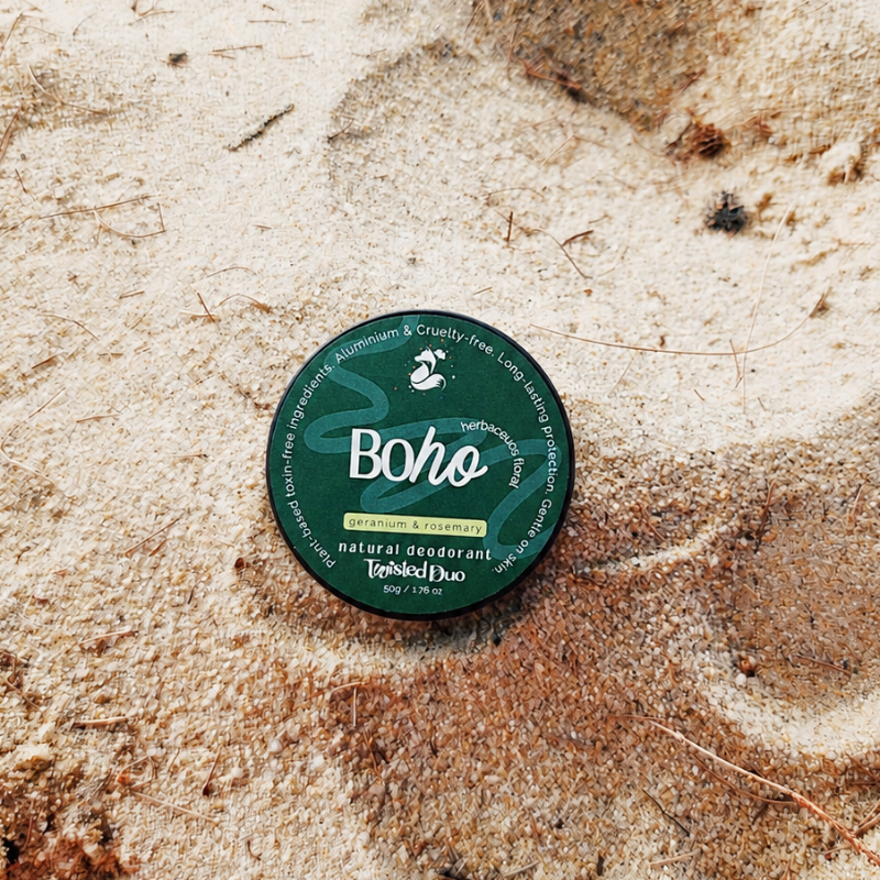 Boho natural deodorant container on a textured beige surface